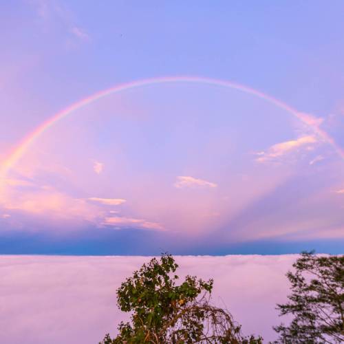 MUSE Photography Awards Silver Winner - Rainbow over the sea of clouds by Mingkai Yang