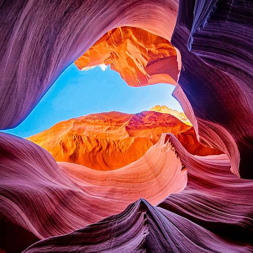 Symphony of the Flowing Earth: A Dance of Light and Shadow - Photography Winner