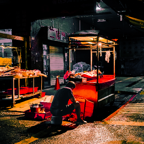 MUSE Photography Awards Silver Winner - The Isolated Stall Owner by Bo-Wei Hsu