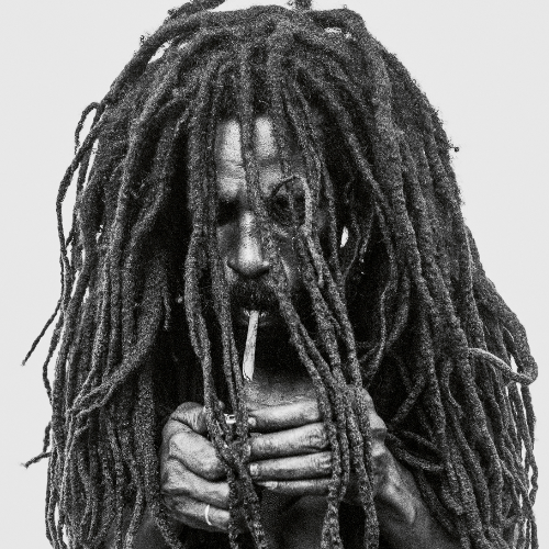 MUSE Photography Awards Silver Winner - Rastafarian Smoking A Joint by Donald Graham