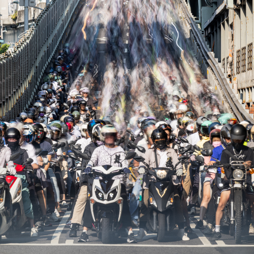 Award-winning photograph The Collective Tide : Scooter Waterfall by SHIH HUNG YANG, 2026 MUSE Photography Awards Gold Winner